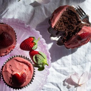 Dark Chocolate Mochi cupcakes with strawberry frosting and fresh strawberries