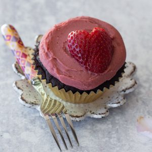 Single Dark Chocolate Mochi cupcake with strawberry frosting